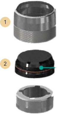 Image showing three distinct mechanical parts labeled 1 and 2. Part 1, a cylindrical metal piece, part 2 appears to be a sealed, rounded component with a small marking, possibly from Baker Hughes. At the bottom is an unmarked round part.