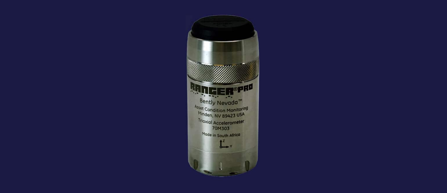 A cylindrical vibration sensor labeled "Ranger Pro" from Bently Nevada, crucial for monitoring machine health and asset condition, resting on a dark blue background.